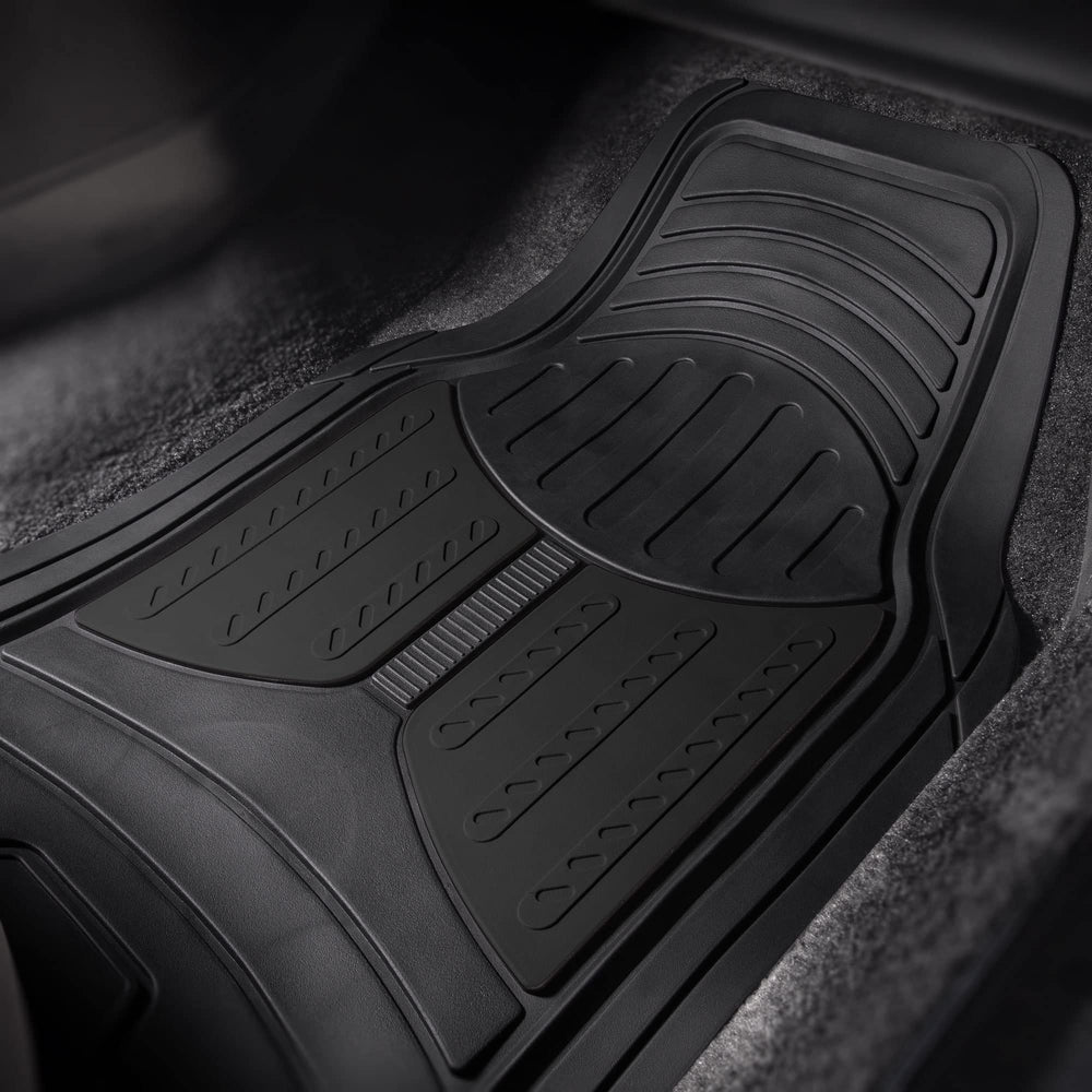 FH Group trim-to-fit rubber mats adapting to vehicle interior shape
