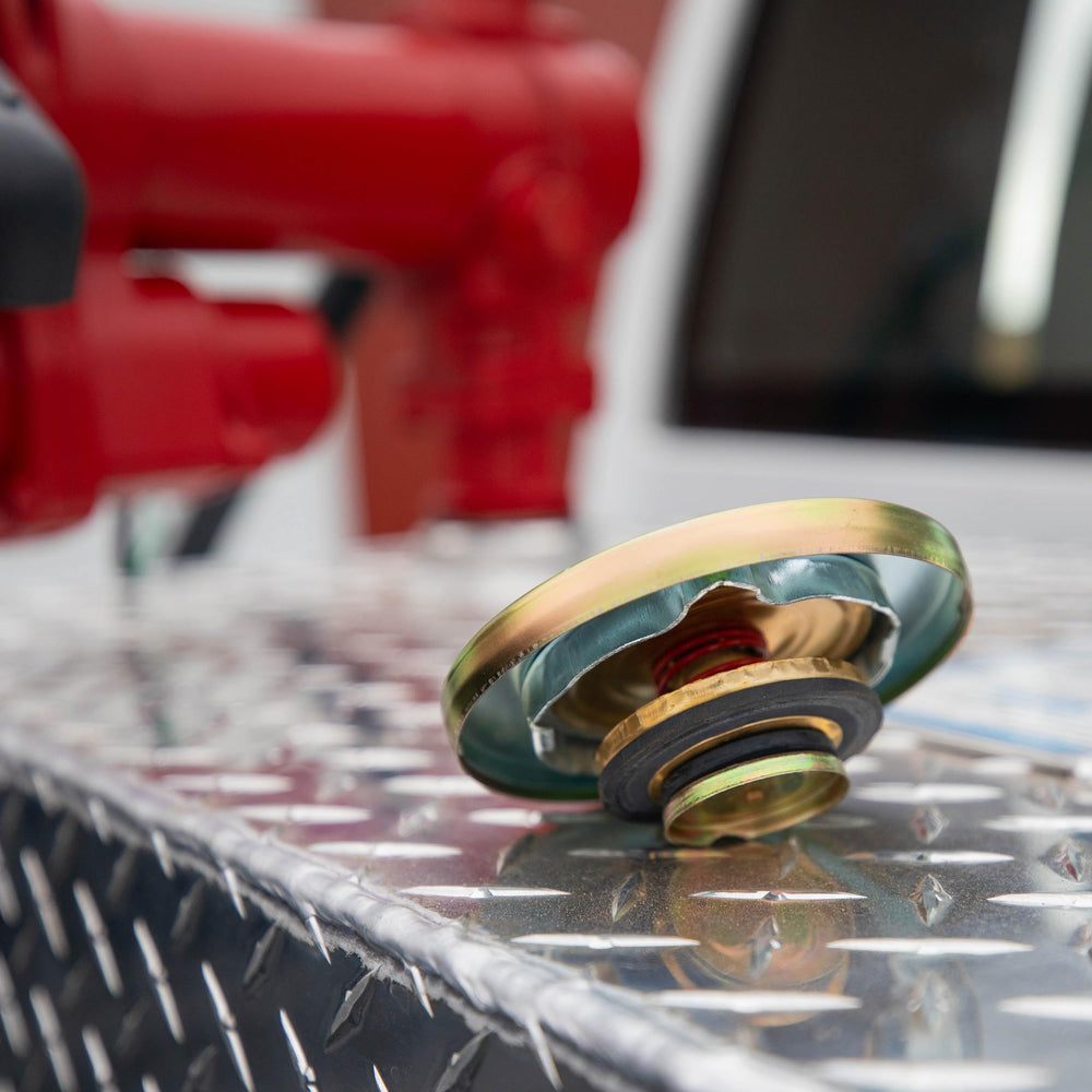 Fill-Rite FRTC venting cap threaded base demonstrates easy installation and reliable seal.