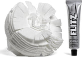 Flitz buff ball with paste ready to shine metal surfaces.