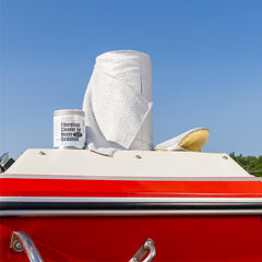 Applying FLITZ cleaner and buffing to reveal a smooth, glossy finish