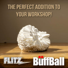Polishing ball in use on painted surface.