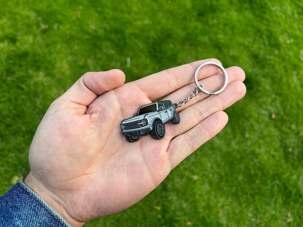 FOUR WHEEL BEAST Bronco keychain black understated look with durable metal.