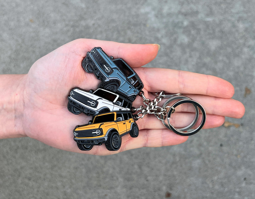 FOUR WHEEL BEAST Bronco keychain red offers high visibility and quick fob access.