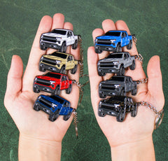 Four Wheel Beast black enamel detail on keychain, subtle contrast for Chevy owners.