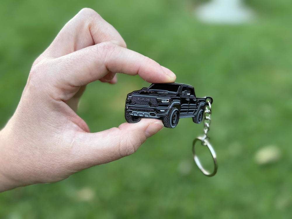 FOUR WHEEL BEAST metal enamel keychain with durable finish