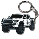 FOUR WHEEL BEAST Tacoma keychain in Quicksand color with durable metal enamel finish.