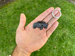 FOUR WHEEL BEAST Tacoma keychain Red with bold finish, a compact gift for Tacoma enthusiasts.