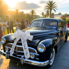 Funtinshdy 30-inch giant bow for a dramatic wedding car ceremony.