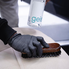 Geist Rapid Leather Cleaner lifts dirt from leather texture and graining.