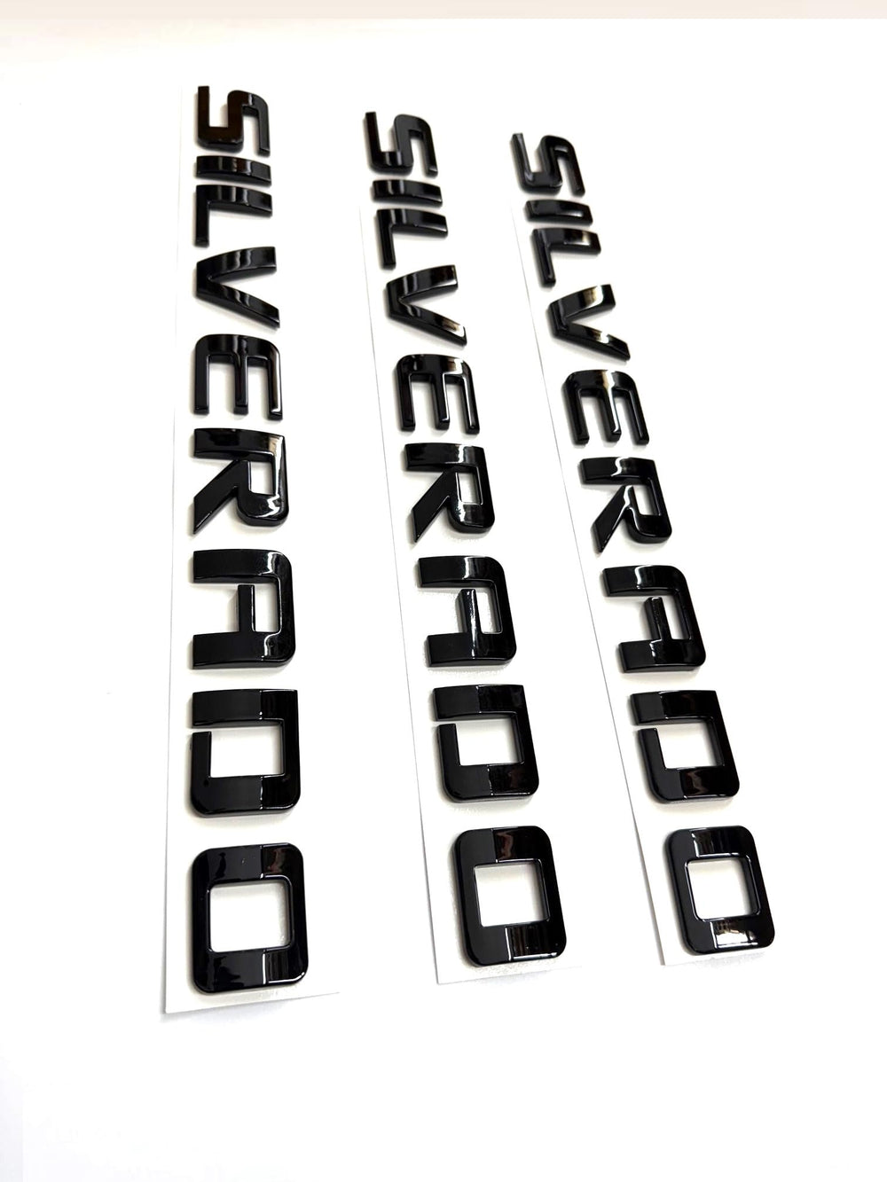 Generic badge emblems for Silverado 2007-2020 with black finish, subtle exterior upgrade