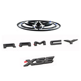 Generic blackout emblem overlay on Camry XSE badge provides a sleek, weather-ready look.