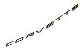 Generic C8 rear emblem in glossy black enhances exterior styling.