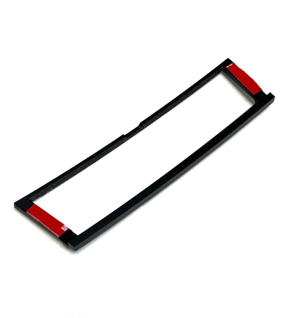 Generic lipped bezel helps retain items like sunglasses during everyday driving