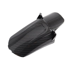 JXMOTONG imitation carbon fiber rear shock fender on Sur Ron demonstrates protective style