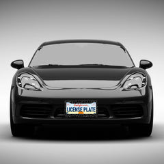 Leopard-print license plate frame installed on a car for standout appeal.
