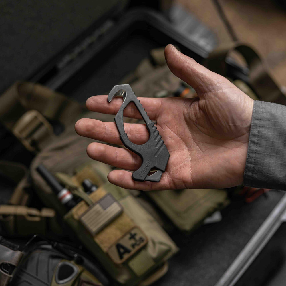 Gerber seatbelt cutter pocket-size tool ready for glovebox storage