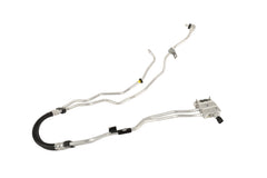 GM Genuine Parts 85724972 oil cooler hose assembly, under-hood view, supports steady engine oil cooling.