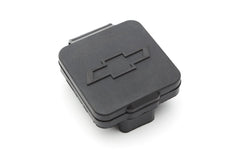 GM Genuine Parts trailer hitch closeout with Bowtie logo conceals hitch opening for a clean rear look.