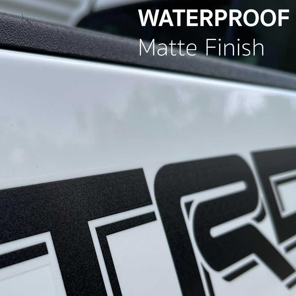 GO-GO.GROUP matte black on clear gloss vinyl demonstrates seamless paint-through look