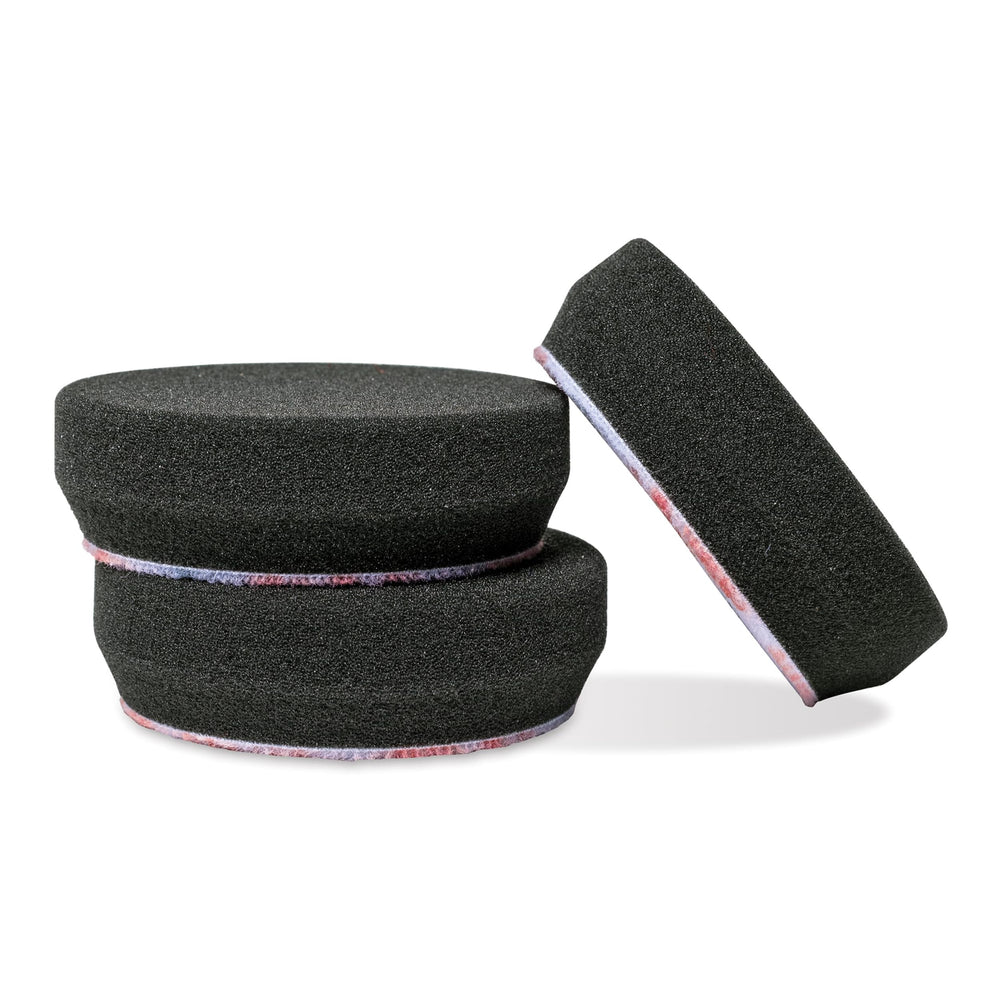 Griot's Garage 3-inch black finishing pad closeup showing delicate-surface texture for swirl removal