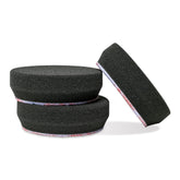 Griot's Garage 3-inch black finishing pad closeup showing delicate-surface texture for swirl removal