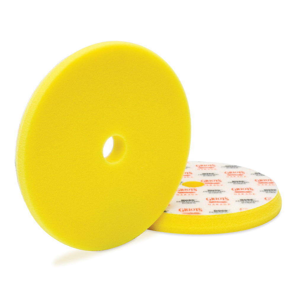 Griot's Garage Perfecting Foam Pad 6.5-inch close-up showing a yellow polishing pad
