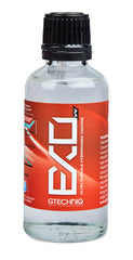 Gtechniq EXO Crystal bottle ready for coating application on a vehicle surface.