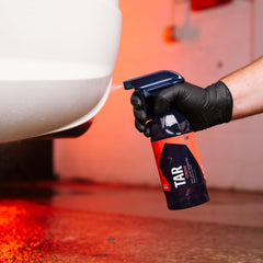 Gyeon Tar Remover tackling road tar on a bumper.