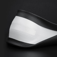Sleek black HAOTULE steering wheel cover complements interior design.