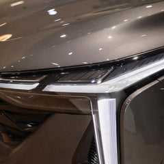 Heinaroman charcoal-grey wrap enhances car aesthetics with a sleek, modern look.
