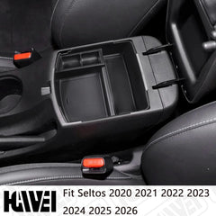 HGWEI armrest insert maintains quick access to small items in the Seltos.