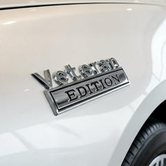 HJKK Veteran Edition close-up of raised lettering and metallic texture