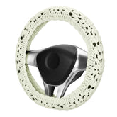 HOMEGYMFREE crochet steering wheel cover with sunflower granny square for vibrant car interior.