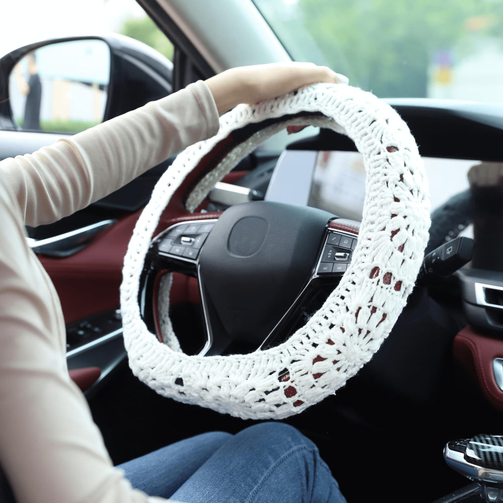 HOMEGYMFREE handmade steering wheel cover using cotton yarn for soft grip.