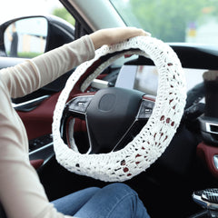 HOMEGYMFREE handmade steering wheel cover using cotton yarn for soft grip.