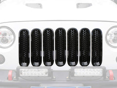 Hooke Road Wrangler JK gloss black grille inserts elevate exterior styling and cohesion.
