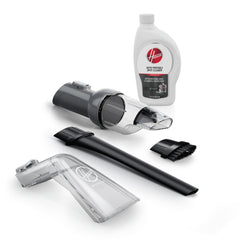 Hoover CleanSlate 5-Piece Kit dry debris tool lifts crumbs from car upholstery.