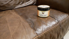 Howard Leather Salve applied to car seat demonstrating deep conditioning