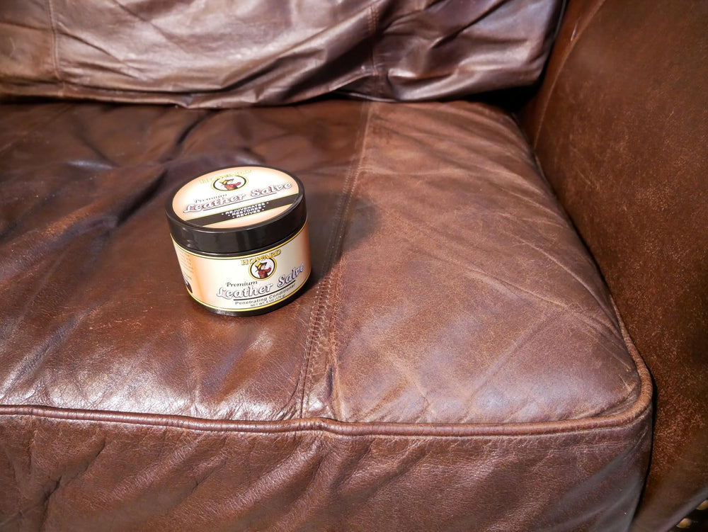 Howard Leather Salve on purse demonstrating wear protection for bags