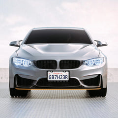 HOWKWAWY frame mounted on car demonstrates universal fit for US plates