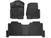 Husky Liners X-act Contour front-row mats offer edge-to-edge coverage.