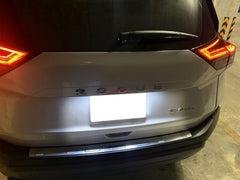 iJDMTOY xenon white LED license plate kit on Nissan Rogue boosts rear visibility.
