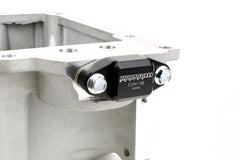 Improved Racing gasketed bypass cover supports a leak-free seal.