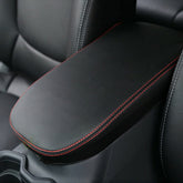 INTGET center console cover for RAV4 protects the lid from wear and spills.