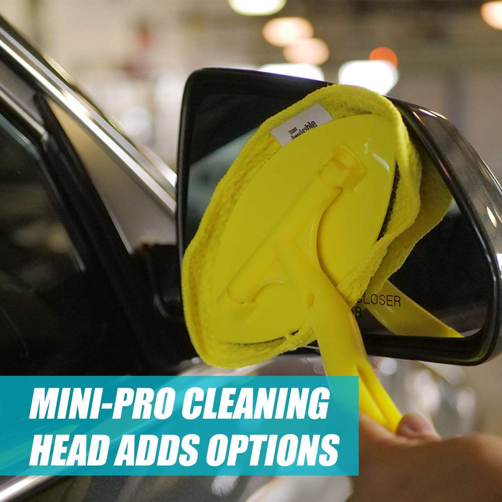 Invisible Glass mini cleaning head reaches tight spaces around edges.