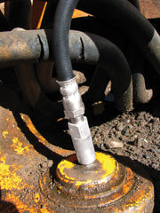 Kit in use on a truck chassis demonstrates unclogging action