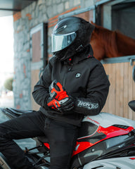 IRON JIA'S jacket side view highlighting adjustable fit and breathability.