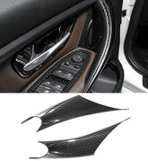 Jaronx carbon-fiber door handle cover on BMW, front driver view highlights protection and style