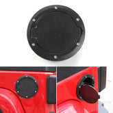 JeCar aluminum gas cap and fuel door on Jeep Wrangler JK, rugged and black finish.