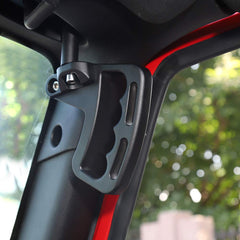 JeCar Front Grab Handles on a two-door Jeep Wrangler JK for compact setup.